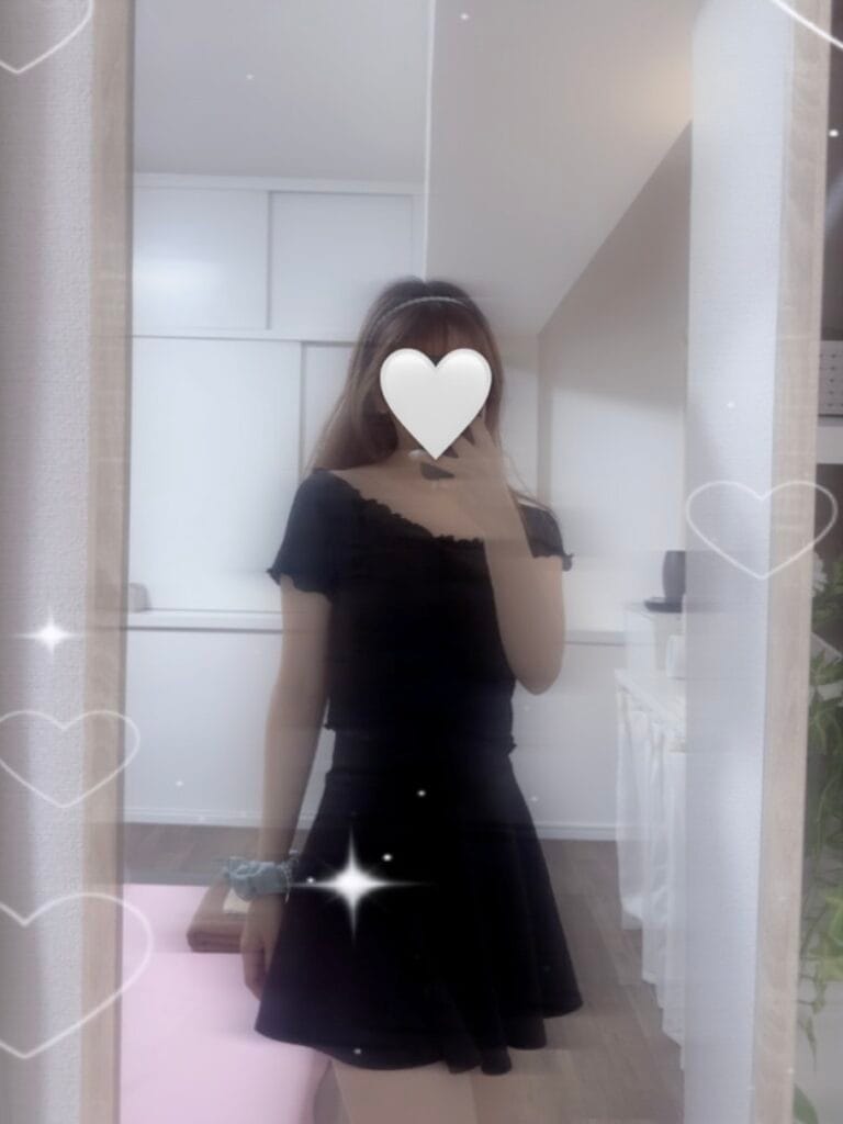 a woman taking a selfie in a mirror