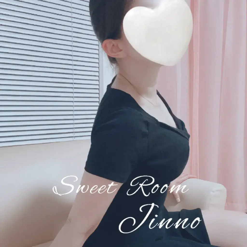 a woman sitting on a couch with a candy face